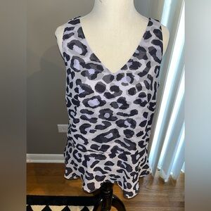 CAbi 5536 feline purple and black peplum sleeveless blouse. Size small.